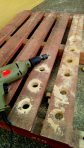 drilling holes in wooden pallet wine rack